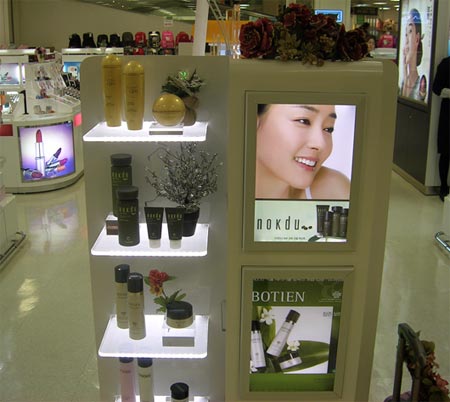 Illuminated LumiSheet shelving for retail applications.